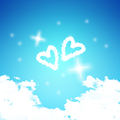 Heart-Shaped Clouds in Blue Sky Image Background