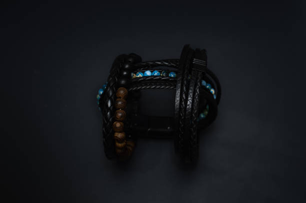 Dark accessories still life with focus on textures.