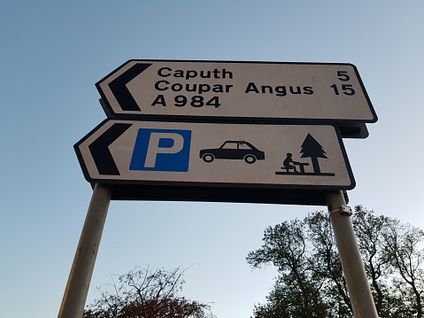 Directional sign to Couper Angus, Caputh and a picnic area and a car park, Dunkeld, Perth and Kinross, Scotland, England UK
