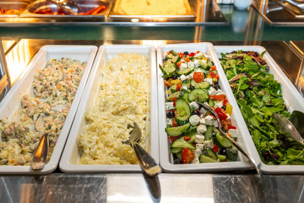 istock Assorted Fresh Salads and Side Dishes Available at Buffet Service 2066703951