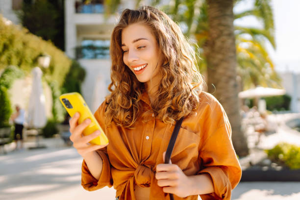 istock Young woman on vacation smiling happy. 2066704478