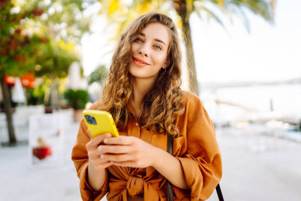 istock Young woman on vacation smiling happy. 2066705044
