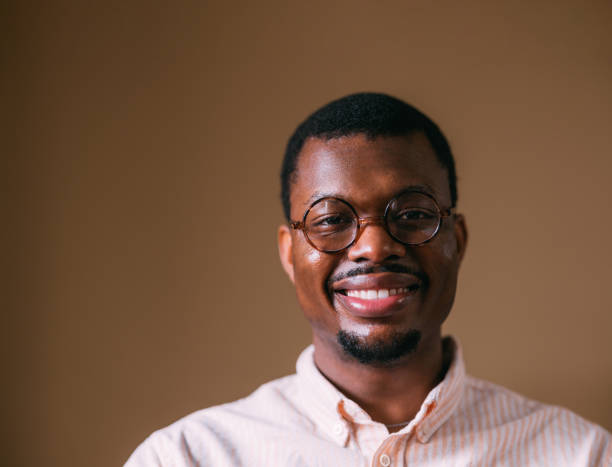 istock Smiling African American Man with Glasses on a Neutral Background 2066722647