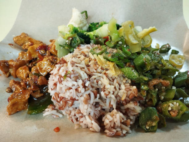 istock broccoli, tofu and okra mixed with brown rice 2066858347