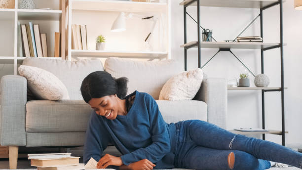 istock Reading weekend home activity woman book relaxing 2066867393