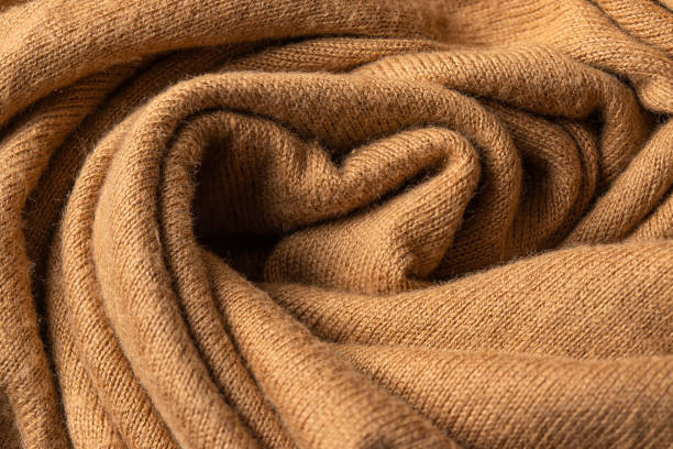 istock Wool texture in beige color ,Abstract kinit fabric for winter clotheng 2066869072