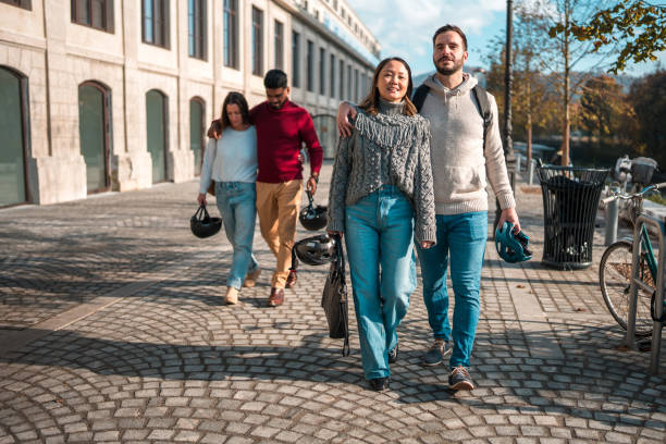 istock Group of Diverse Friends Walking Together in Urban Setting 2066869664