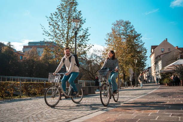 istock Diverse Friends Riding Bicycles in Urban Setting 2066869680