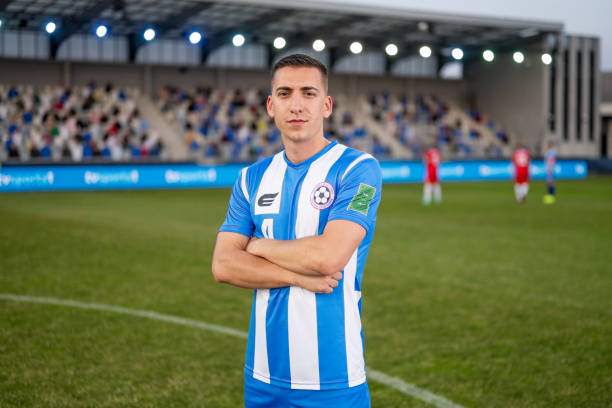 istock Confident Male Soccer Player Portrait on Field 2066875733