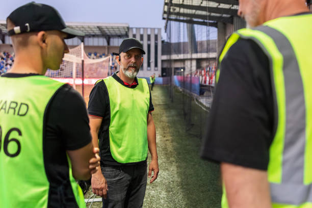 istock Focused Male Security Guards at Football Match 2066875781