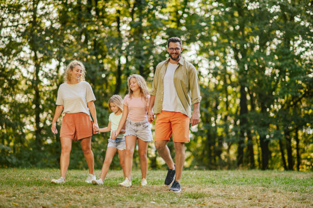 istock An affectionate family spending day together in nature. 2066880484