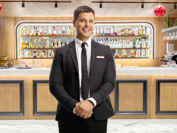 istock Hotel manager posing at the bar 2067026012