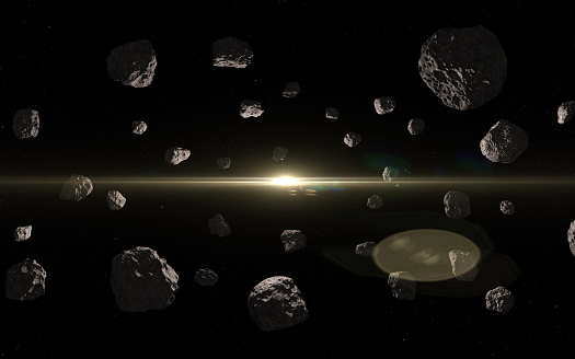 Asteroids and sun. Dark outer space, meteorites or debris of a destroyed planet and sun. High resolution image.