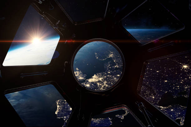 istock The night Earth from porthole on space station. 2067040433