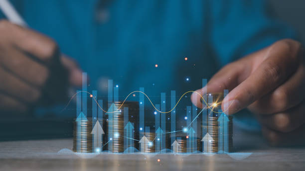 istock Businessman stacking coins with screen forex trading graph financial data. Goal business profit graph development. Stock market, financial growth report. 2067146110