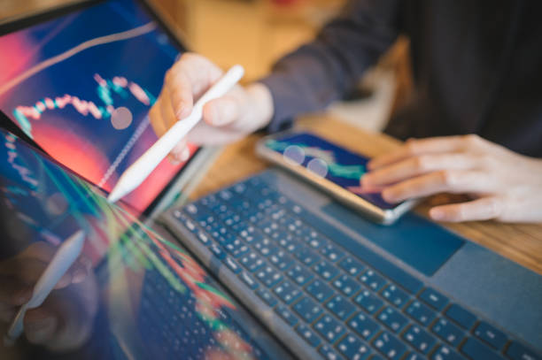 istock GenZ Investor trading making interacting with AI automated system with chart analysis big data stockmarket selected best stock with data 2067206651