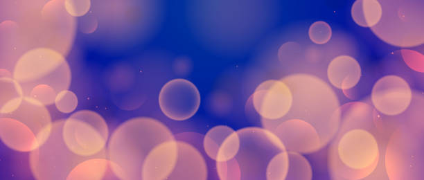 istock Blur warm bokeh on blue background. Pink yellow blurred effect wallpaper. Abstract shiny glitter, sparks and sparkles. Glowing backdrop for Christmas, New Year or birthday card, poster, banner. Vector 2067222965