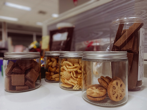 Various dry cakes in a jar