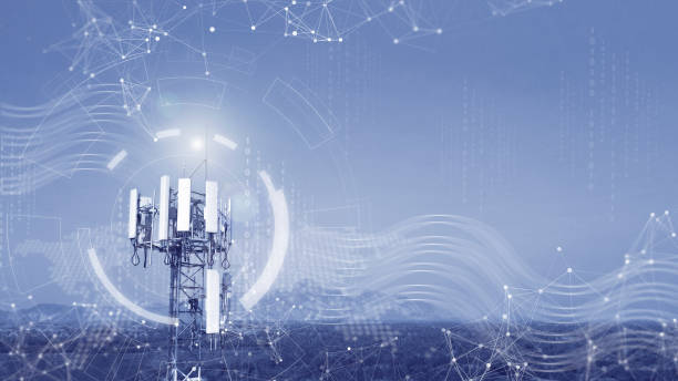 istock Telecommunications tower with 5G transmitter. Cellular base station with telecommunications transmitting antenna against technology background. 2067346157