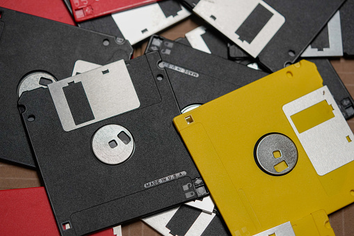 Old retro floppy disks 5.25 on a white background, retro style