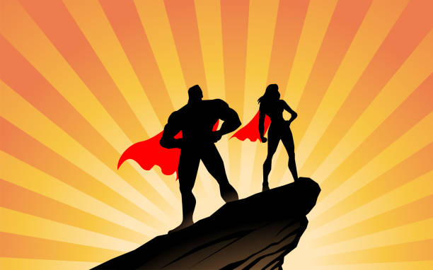 istock Vector Superhero Duo Silhouette on a Rock Stock Illustration 2067449426