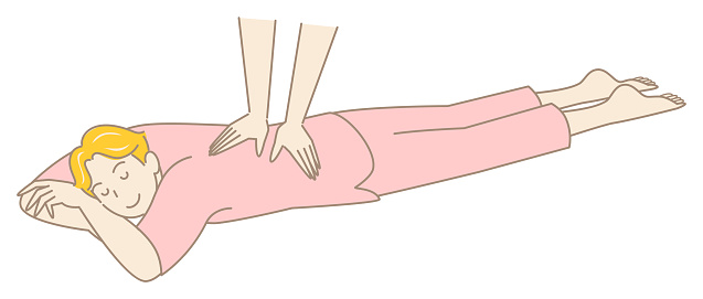 Cute man in massage gown lying on his stomach receiving massage. Simple Illustration Vector