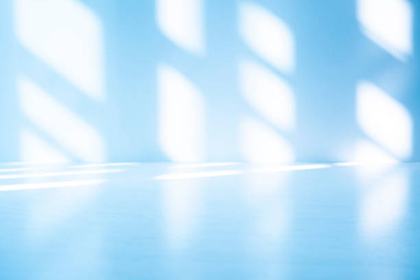 istock Wall interior background, studio, and backdrops show products. with shadow from window color white and blue light. background for text insertion and presentation of product 2067519584