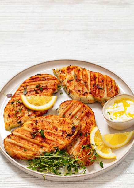 istock juicy grilled chicken cutlets on plate, top view 2067637200