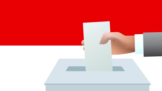 Man putting ballot in a box during elections in Indonesia in front of flag.