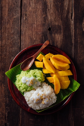 Mango Sticky Rice on wooden background