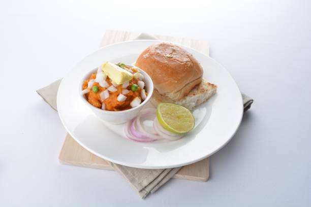 istock indian vegetable bean curry with baked bread bun burger toast onion lime breakfast on white background asian chef appetiser halal bakery food restaurant pastry menu for cafe 2067703895