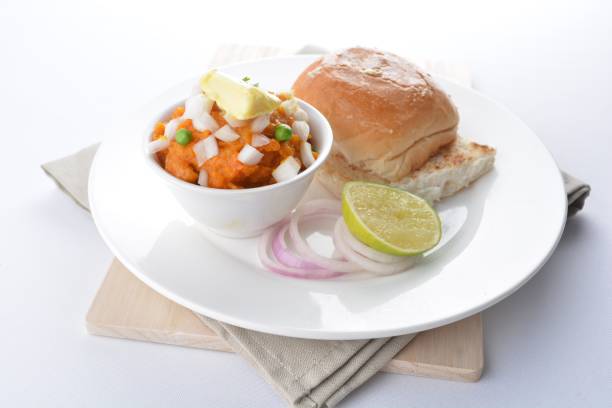 istock indian vegetable bean curry with baked bread bun burger toast onion lime breakfast on white background asian chef appetiser halal bakery food restaurant pastry menu for cafe 2067703896