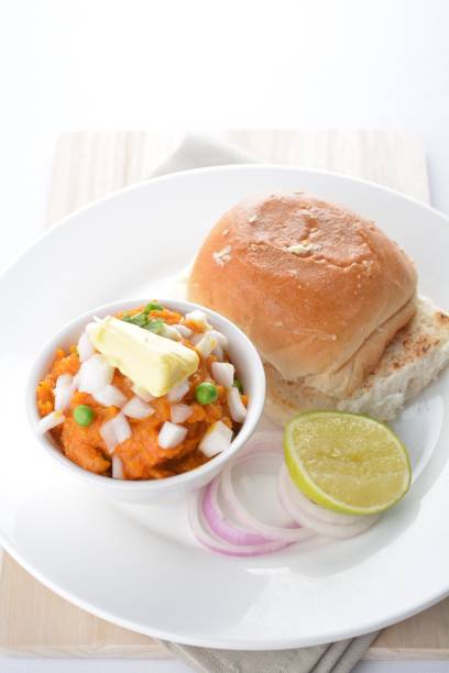 istock indian vegetable bean curry with baked bread bun burger toast onion lime breakfast on white background asian chef appetiser halal bakery food restaurant pastry menu for cafe 2067703908