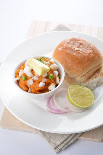 istock indian vegetable bean curry with baked bread bun burger toast onion lime breakfast on white background asian chef appetiser halal bakery food restaurant pastry menu for cafe 2067704445