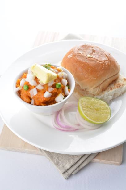 istock indian vegetable bean curry with baked bread bun burger toast onion lime breakfast on white background asian chef appetiser halal bakery food restaurant pastry menu for cafe 2067704980