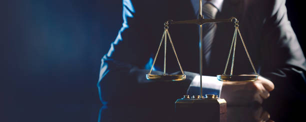 istock A man is standing in front of a scale with a tie 2067713393
