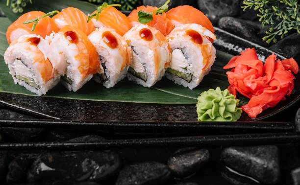 istock sushi rolls with shrimp and salmon 2067716153