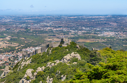 Panoramic aerial view from the Pena Palace of the Arab castle, built by the Moors, taken by the Vikings and conquered by the King of Portugal. In Sintra, Portugal. Castelo dos Mouros