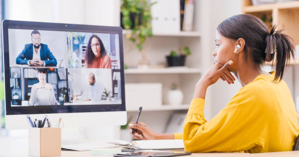 istock Video call, computer and communication, business woman in virtual meeting while working from home. Video conference, online discussion and connection, female worker make notes, corporate and team. 2067745839