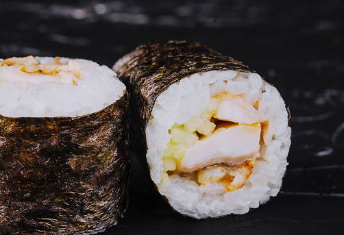 Eel fish sushi rolls set on black
