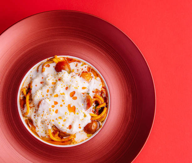 istock Italian spaghetti pasta with baked cherry tomatoes 2067777707
