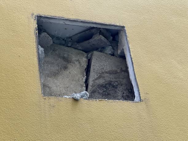 istock a photography of a window with a broken glass in it. 2067806859