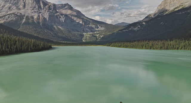 Emerald Lake BC Canada Aerial v8 flyover lakeside lodge at Yoho National Park, capturing calm waters and coniferous forests surrounded by mountain ranges - Shot with Mavic 3 Pro Cine - July 2023