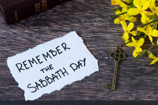 istock Remember the Sabbath Day, handwritten note with holy bible and ancient key on wood 2067838669