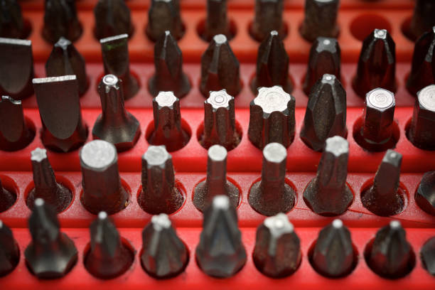 Close up of a large group of screwdriver tips for fastening screws.