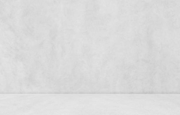 istock Empty gray concrete room studio background. Background for displaying product. 2067878368