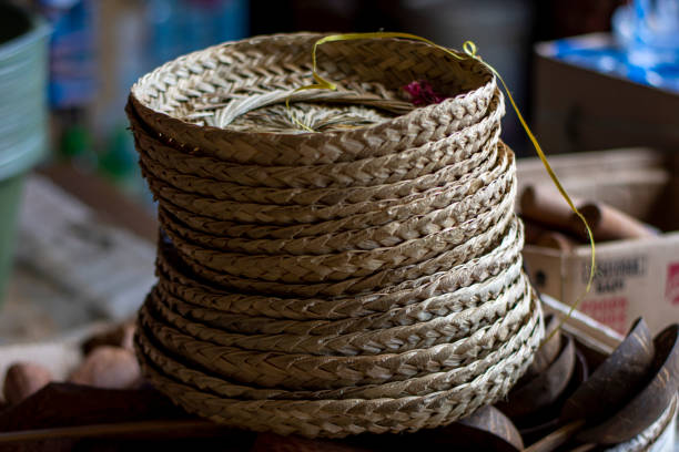A selection of hand crafted woven bamboo bags, baskets and other craft.