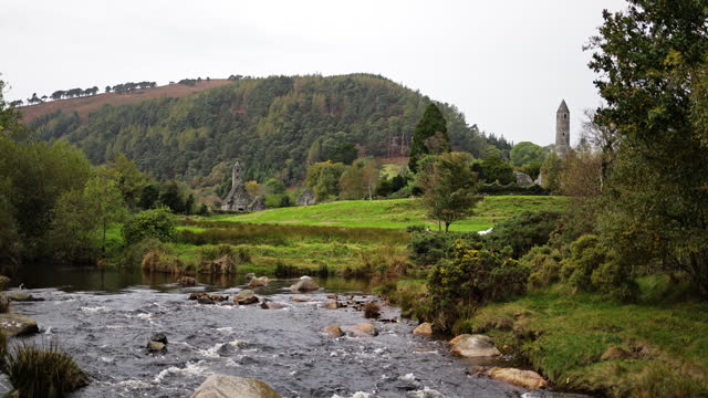 View of Glendalough ruins in Wicklow Ireland, view of Glendalough abbey, view of Glendalough upper and lower lakes in Ireland, popular tourist destination in Ireland