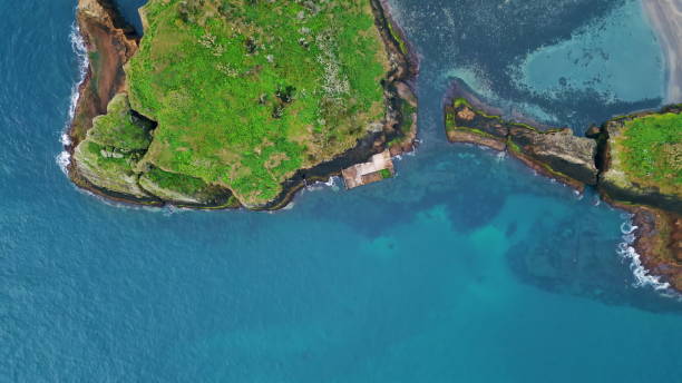 istock Aerial ocean cliffs coastline view. Turquoise ocean washing serene seashore 2067906034