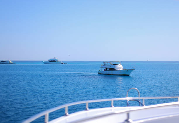 Seascape with white yacht sailing the sea